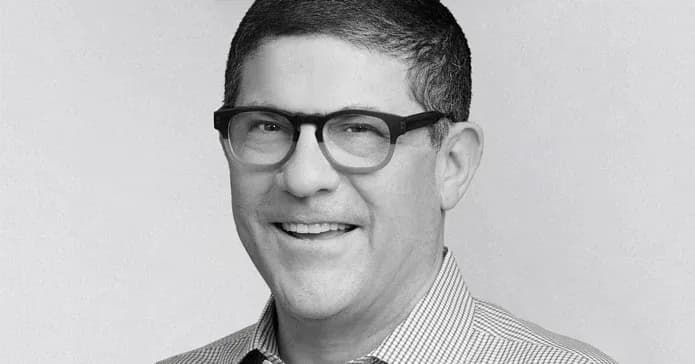 Doug Levin headshot in black and grey